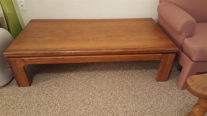 Oak coffee table. Matching end tables also pictured and available