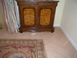One of a pair of French style marble top cabinets