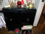 50's television in black Art Moderne cabinet