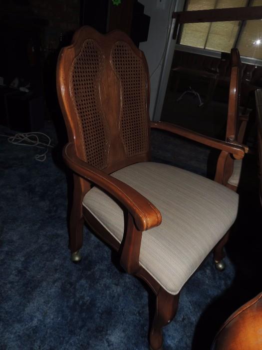 One of 4 Chairs on Casters that go with the dining table. 