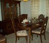 Dining table with 4 chairs plus china cabinet.