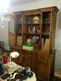 Fruitwood dining room table, chairs & china cabinet