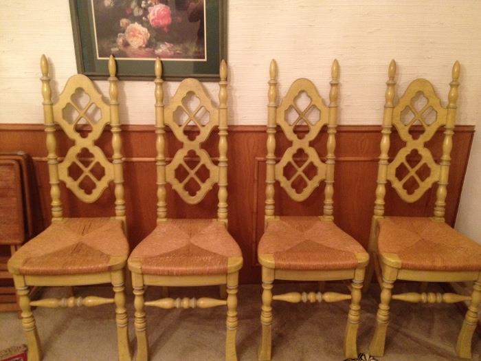 Great set of four very unique chairs with woven seats and fun backs and legs