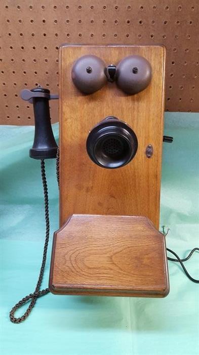 Antique phone, inside has been adapted for rotary style phone