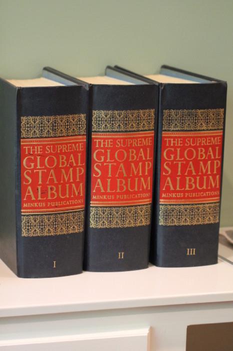 Global Stamp Album volumes I, II and III (with a few stamps mounted inside)