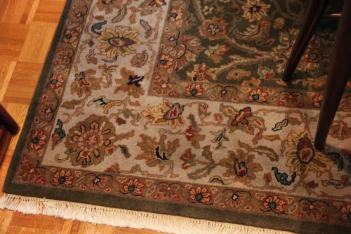 hand-tied rug in dining room