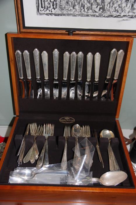 Lunt William and Mary sterling silver flatware set (small Gothic "C" monogram). Some pieces are new in package and unused.