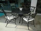 The Armchairs were Sold but we still have the Heavy Wrought Iron Table