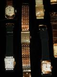 14 K Gold Longines (center) flanked by Two Vintage Hamiltons (above)