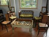 An Italian Hand-Carved Vitrine Table w/ a Pair of Italian Ebonized Hall Chairs and another Pair of Side Chairs.  The Settee has been SOLD.