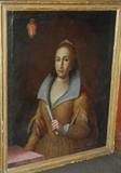 This is a Portrait of a Member of the Colonna Family (note the crest in the upper left).  The Colonna family was an Italian noble family; it was powerful in medieval and Renaissance Rome, supplying one Pope and many other Church and political leaders. Their family is notable for their bitter feud with the Orsini family over influence in Rome until it was stopped by Papal Bull in 1511