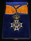 A Silver-Gilt & Enameled Maltese Cross in it's Original Presentation Case Awarded by the Dutch Queen for Meritorious Service to the Crown.  ca. 1892