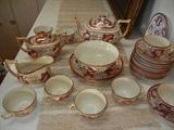 An Antique English Gold-Decorated After-Dinner Set.