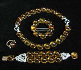 Exquisite Cartier Art Deco Topaz and Diamond Parure, consisting of: a 2-part Necklace which separates to form 2 Bracelets; a double-strand Bracelet; a Ring; & a Brooch.
NOTE:  These items will NOT be available for viewing during the sale.  Please inquire.
Thanks!