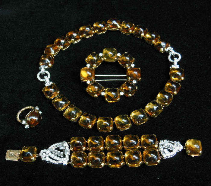 Exquisite Cartier Art Deco Topaz and Diamond Parure, consisting of: a 2-part Necklace which separates to form 2 Bracelets; a double-strand Bracelet; a Ring; & a Brooch.
NOTE:  These items will NOT be available for viewing during the sale.  Please inquire.
Thanks!
