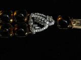 A Close-Up of the Art Deco Platinum-Diamond Clasp on the Cartier Topaz Bracelet.
NOTE:  Please inquire, as this will not be available for view during the sale.