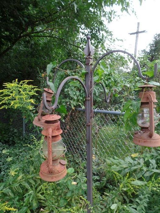 Wrought iron hanger and old lanterns
