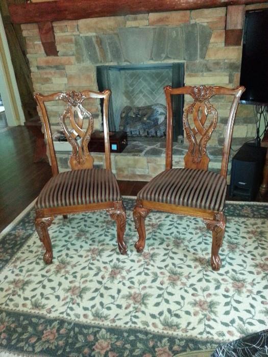 Two very comfortable ornate side chairs.