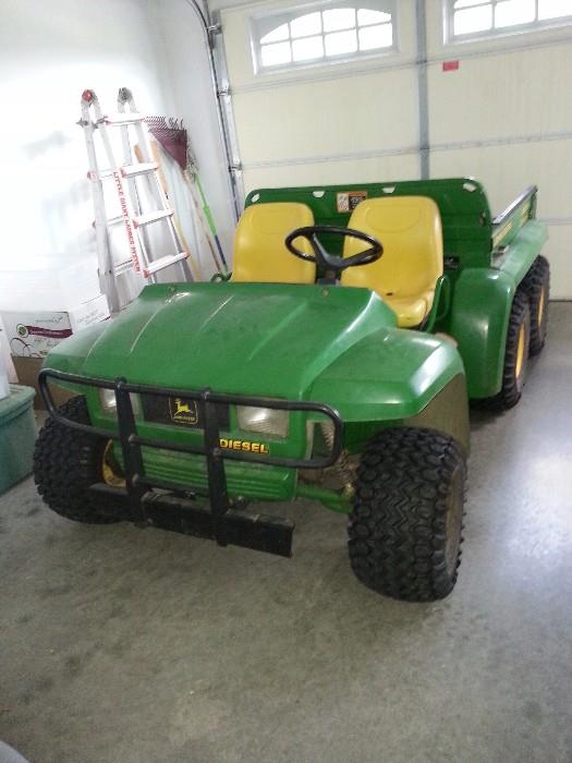 Six wheel diesel John Deere Gator with dump. Approximately 10 years old and extremely maintained.