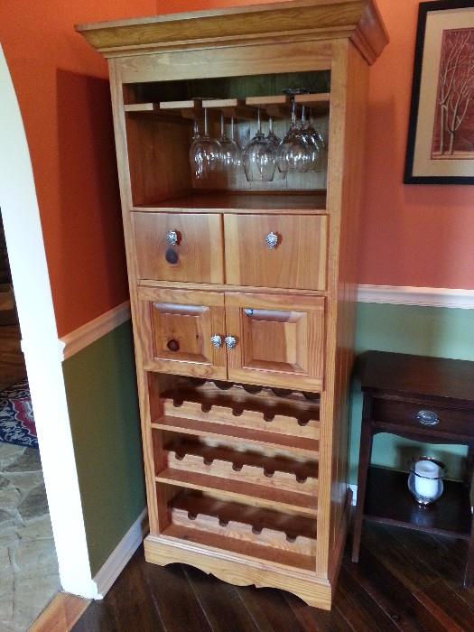 Beautiful Hand crafted pine wine rack with storage for glasses.