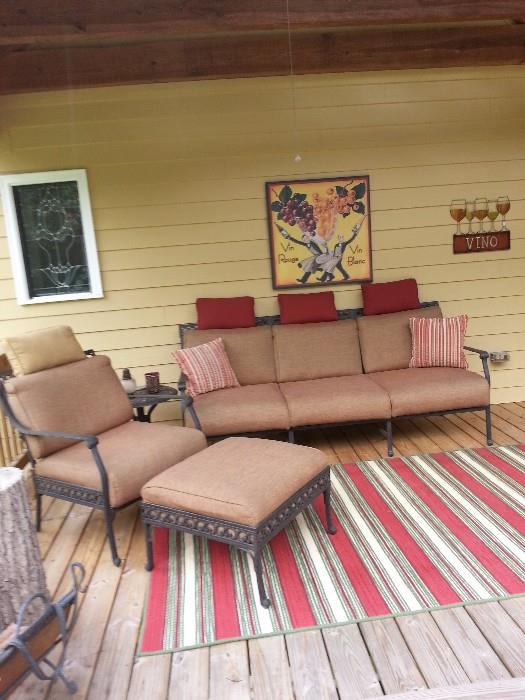 This really nice set includes a sofa, chair, ottoman, table and pillows. The rug is also for sale, and pictures. 