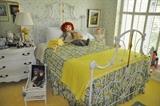 Full sized antique wrought iron and brass bed