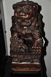 A Pair of large wooden Foo Dogs on stands
