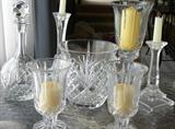 Crystal-vase, ice bucket, decanter, candleholders.