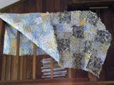 Rag quilt, blue, white and yellow.