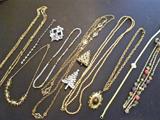 Selection- vintage costume jewelry Christmas tree pins, chains, station necklaces, pendants.