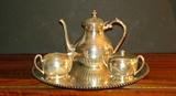 Silverplate coffee pot, sugar, creamer, tray.