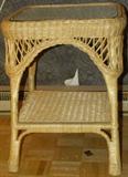 Wicker square glass topped end table.