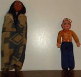 Skookum vintage native American doll, and fireman doll.
