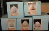Selection from Lladro ball and bell Christmas ornaments in original boxes.