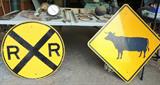 Vintage railroad crossing sign, other signs, cow crossing, selection from tools-saws-one man and two-man, torches, hammers, axes, sledges, levels, wrenches, bits, much more.