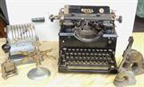 Selection from vintage office equipment, Royal typewriter, other typewriters, stamps, stamp holder, seals, Paymaster check writer.