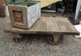 Alternate view Wellsbach painted wood tool chest on top of vintage industrial dolly with hardware signed "Fairbanks Co." The dolly is ready to go for use as is in your workspace maybe in a refurb project-could be topped with glass as a coffee table.
