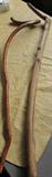 Several wood hand-made walking sticks.