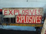 Vintage explosives signs. The large white one is made of wood; the smaller red one is metal. Great decorative touch for your man cave, rec room or garage!