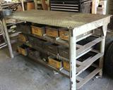 Heave duty industrial work table with slide-out bins. Great for workshop, garage, metal or glass artisan or crafter.