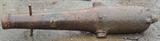 Full length view of 19th c. cannon. Approx. 9' long. No identifying marks that I could find-only detail are the impressed circles around the edge of the barrel.