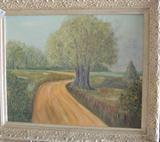 Landscape painting in beautiful carved frame.