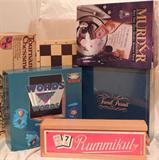 Selection from board games, including Trivial Pursuit Genius (unopened), and Rummikub wooden boxed set.