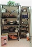 Selection from general household items, cookware, bakeware (some new in package), small appliances, large electric coffee pot, baskets, Revere Ware large covered pot, vases, coffee pump Thermos, stainless mixing bowls, travel iron, more. Note: shelving units are not for sale.
