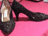 Vintage black lace beaded pumps.