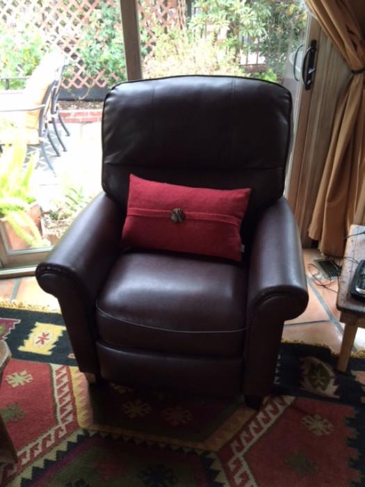 leather chair, native carpet rug