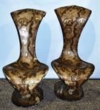 Item Description: A pair of funky Modern metal chairs by Art Max boasting an unconventional style, Art Max's company's team of designers led by Richard Chan have designed a unique look that sets other furniture designers apart. The chairs have a free formed Dr. Seuss-like shape, comprised of metal covered with a gilded plaster composition embellished with an embossed floral design.