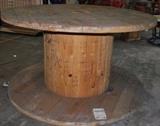 Item Description: A giant wooden electrical spool, would be great repurposed as a table!
