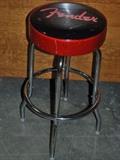 Item Description: A retro style brand new Fender stool with Fender Logo cushioned seat and chrome base.