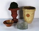 Item Description: A great assortment of decorative items including two planters, a decorative moss ball, a lovely clay bowl in shades of brown and five clear glass candle under plates.